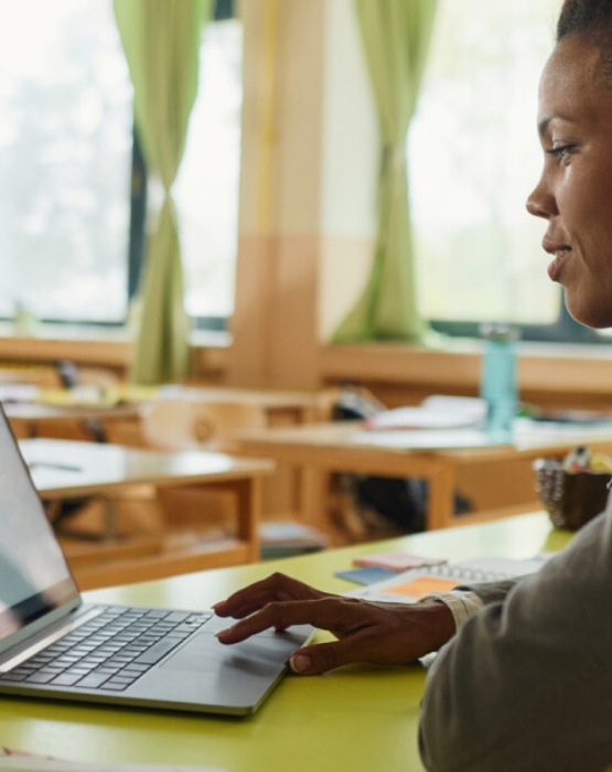 a person looking at her laptop computer
