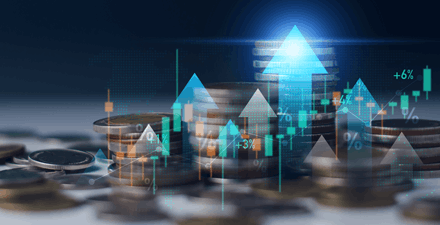 Rising interest rate concept - stack of coins and opaque arrows in various colors and sizes pointing upward.